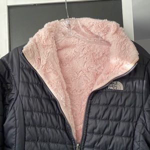 The North Face reversible jacket. Furry, super soft pink and Black puffer